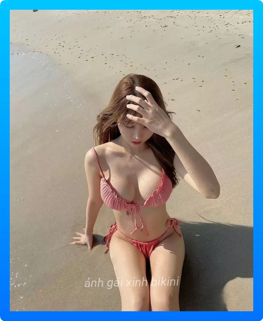 Gai xinh bikini dep rang ro duoi anh nang
